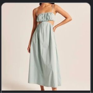 Cut-out dress. Brand new, never worn